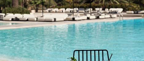 2 outdoor pools, pool umbrellas, pool loungers