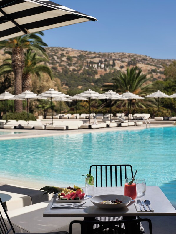 2 outdoor pools, pool umbrellas, pool loungers
