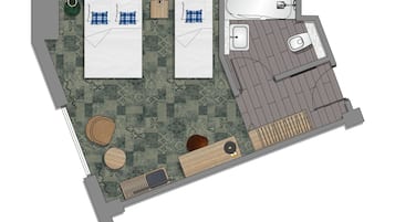 Distribución de una habitación de hotel con dos camas, baño, un espacio de descanso pequeño y ducha.