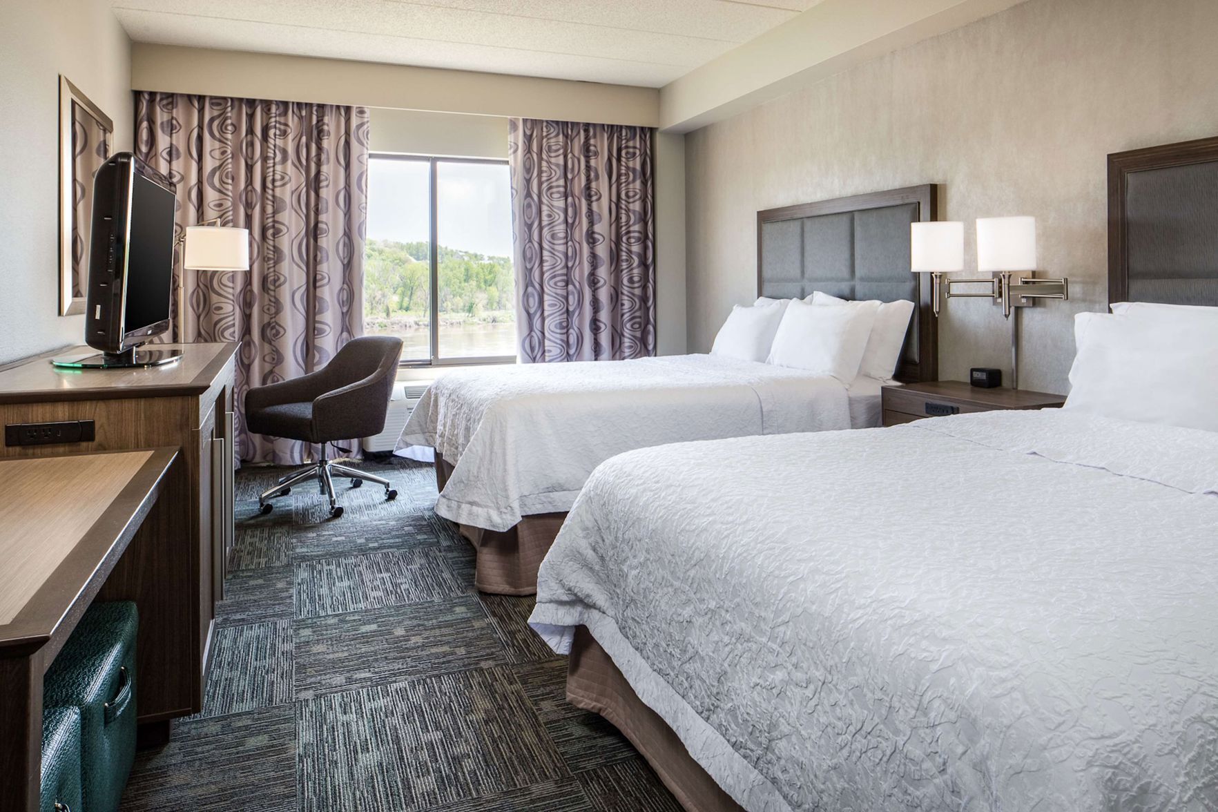 Laptop workspace, iron/ironing board, free cribs/infant beds