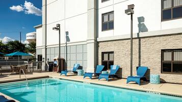 Outdoor pool, open 7:00 AM to 10 PM, sun loungers