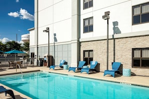 Outdoor pool, open 7:00 AM to 10 PM, pool loungers
