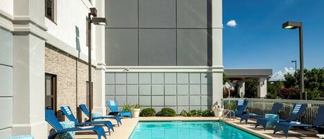 Outdoor pool, open 7:00 AM to 10 PM, sun loungers