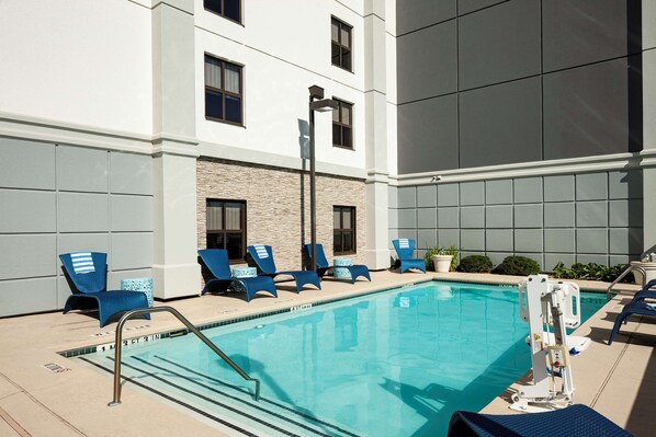 Outdoor pool, open 7:00 AM to 10 PM, sun loungers