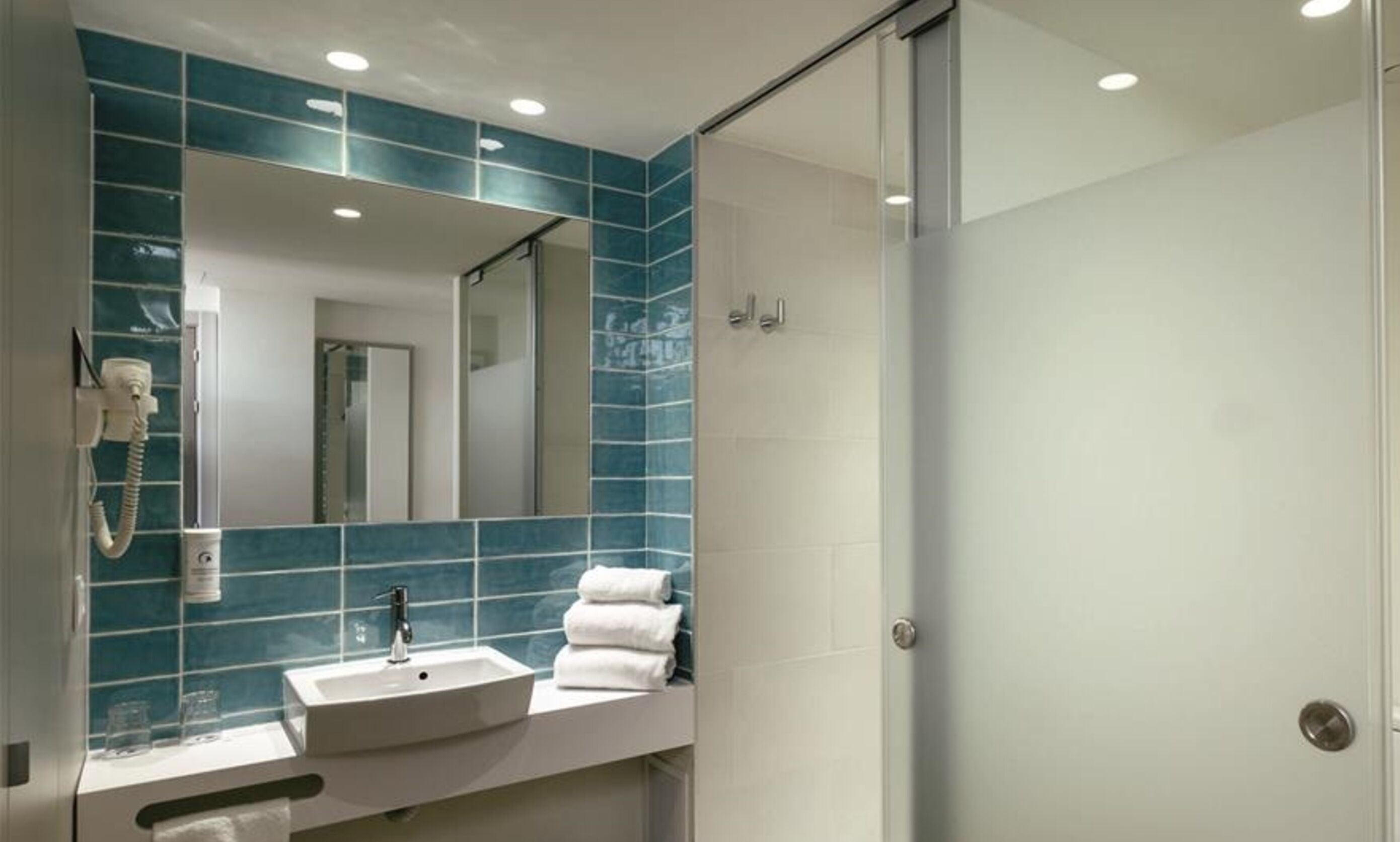 Bathroom | Shower, free toiletries, hair dryer, towels