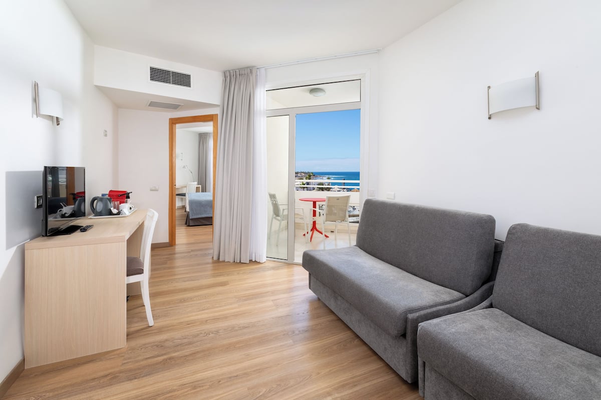 Junior Studio Suite, Balcony, Sea View | Desk, soundproofing, WiFi (free), bed sheets
