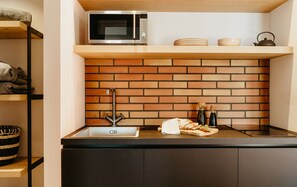 One Bedroom Serenity Sea Front suite | Eget tekjøkken | Kjøleskap, kokeplater, vannkoker og kjøkkenutstyr