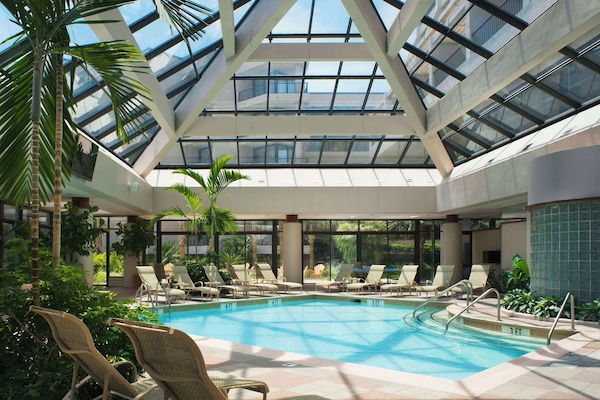 Indoor pool, 2 outdoor pools, open 7:00 AM to 9:30 PM, pool umbrellas