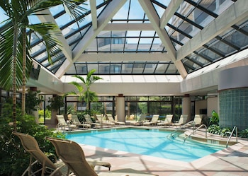 Indoor pool, 2 outdoor pools, open 7:00 AM to 9:30 PM, pool umbrellas at Hilton Beachfront Resort & Spa Hilton Head Island