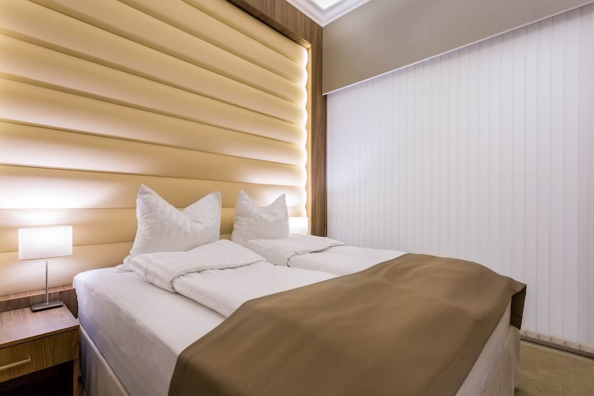 Superior Room (Interior room without outside view) | Hypo-allergenic bedding available, in-room safe, desk, laptop workspace