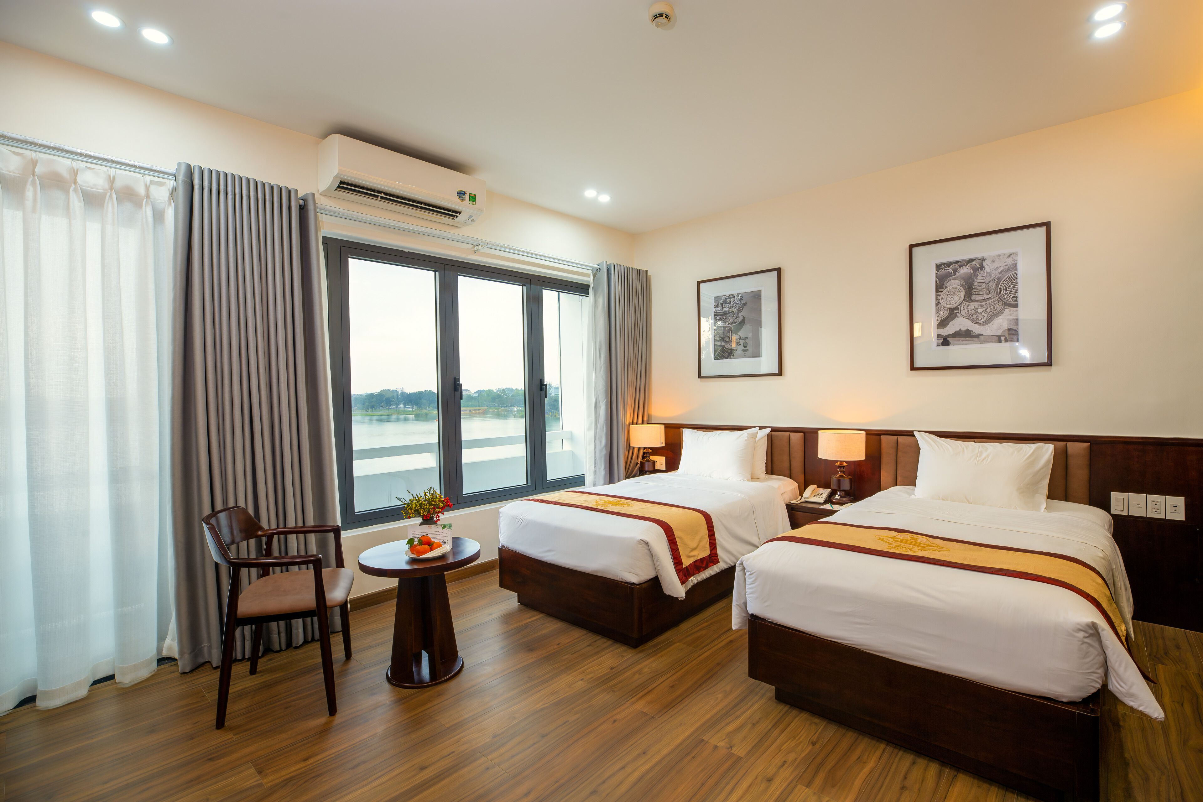 Premier Room, 2 Twin Beds, River View | Minibar, in-room safe, desk, laptop workspace