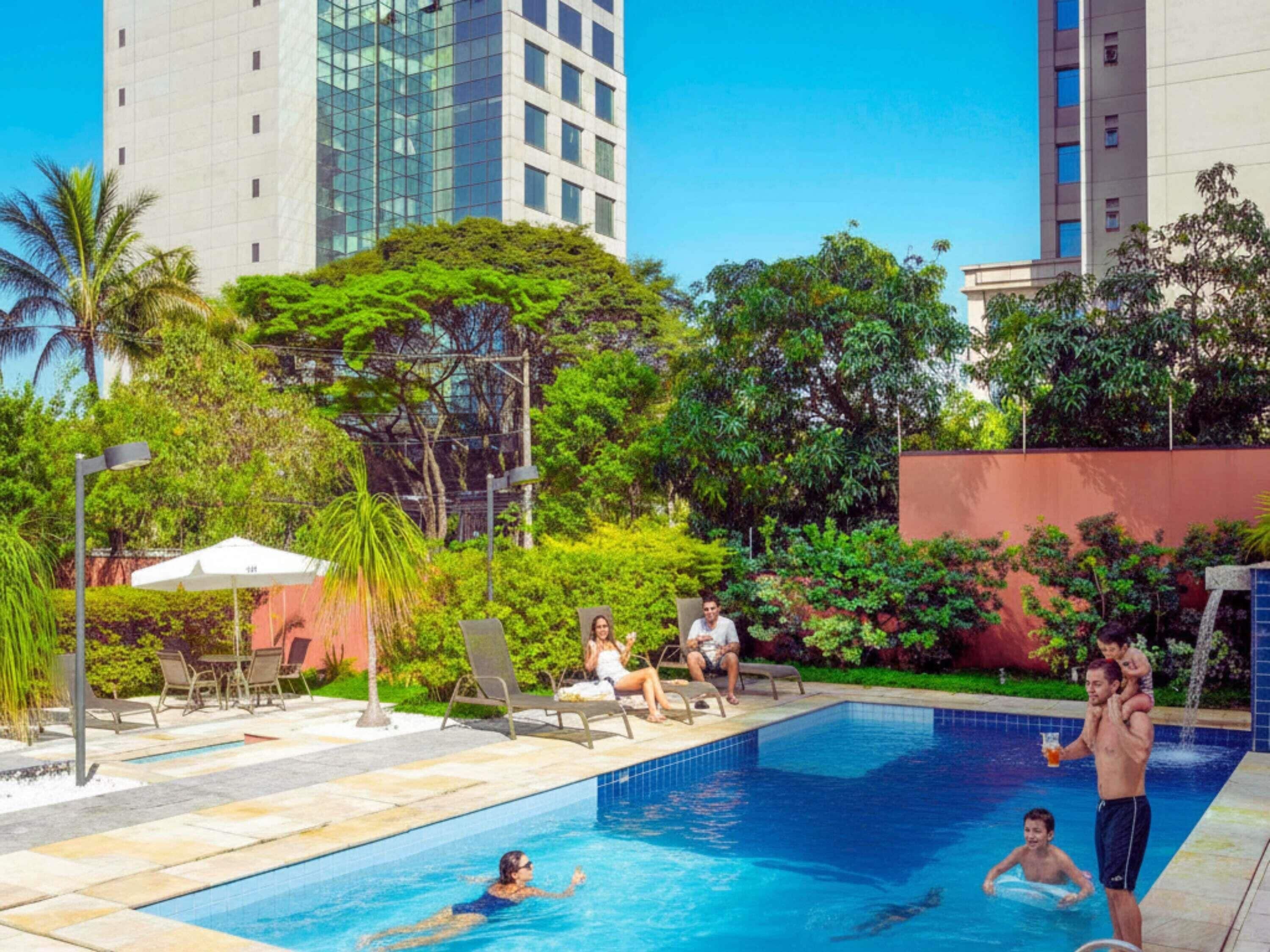 2 outdoor pools, open 6:00 AM to 10:00 PM, pool umbrellas, sun loungers