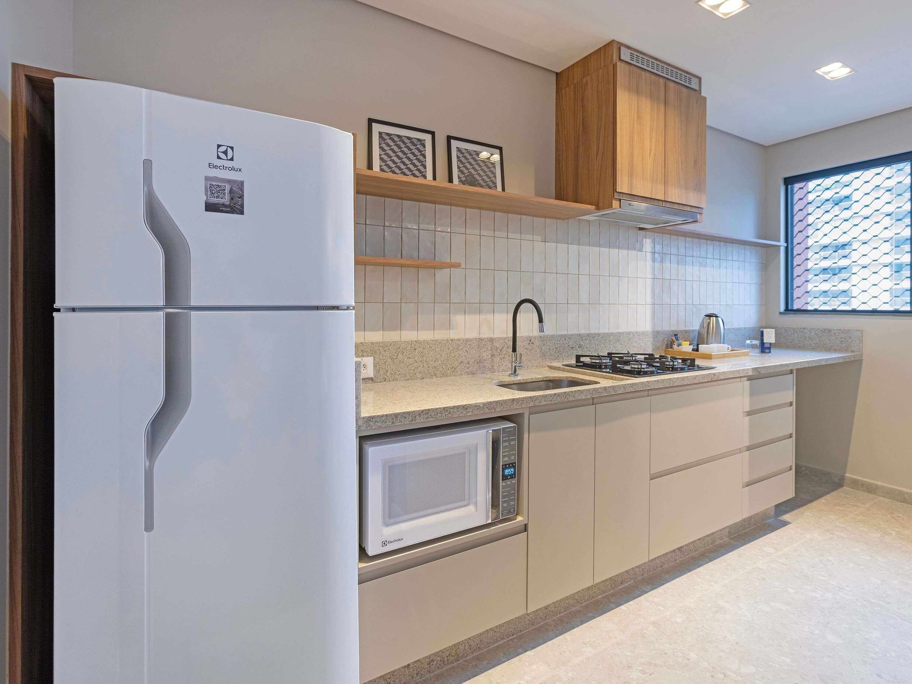 Apartamento Premium, 1 cama casal 1 cama solteiro e 1 banheiro | Minibar, in-room safe, individually decorated, individually furnished