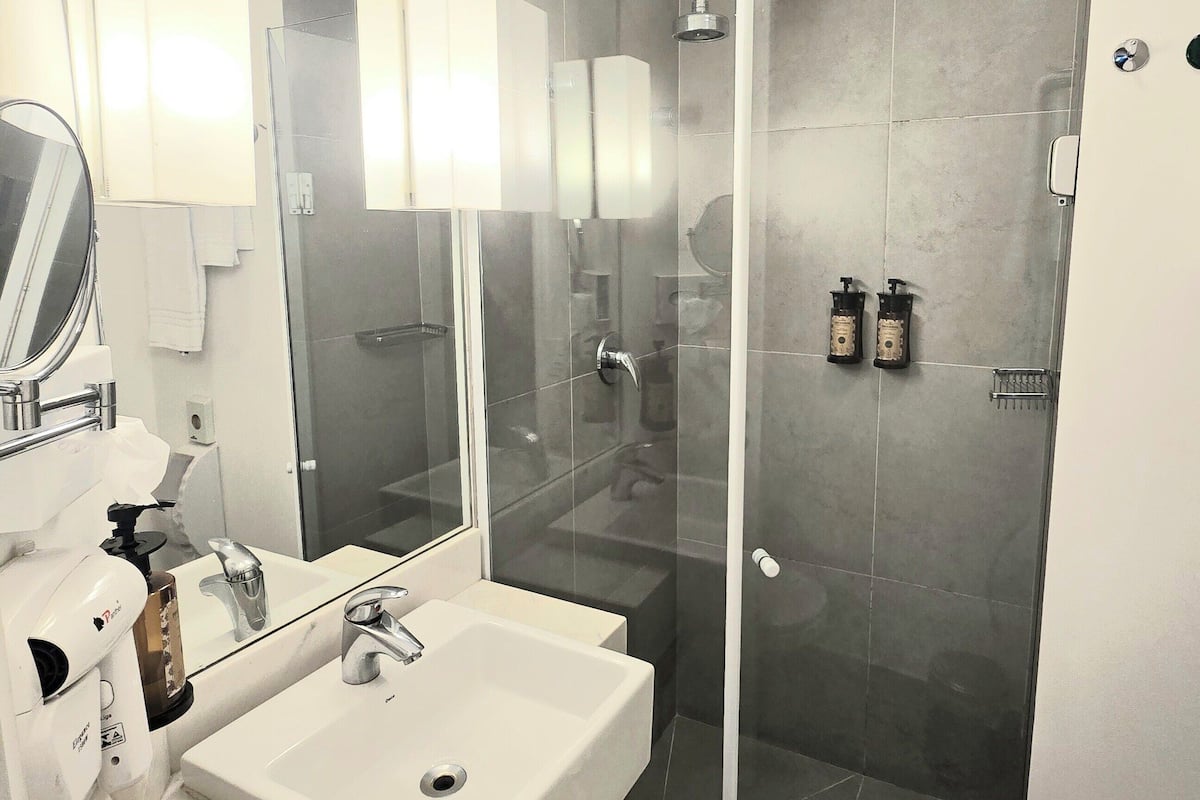 Shower, rainfall showerhead, eco-friendly toiletries, hair dryer