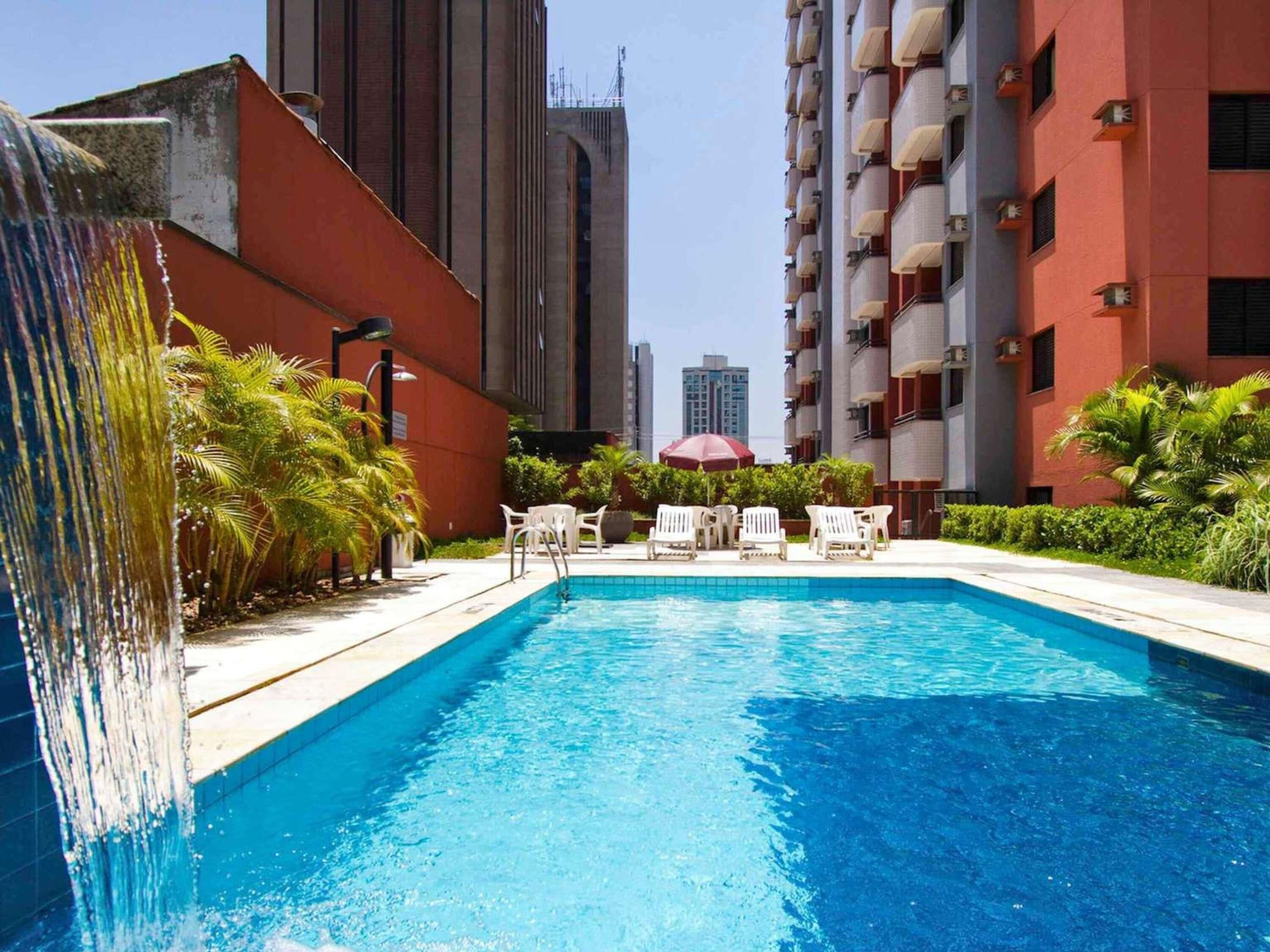 2 outdoor pools, open 6:00 AM to 10:00 PM, pool umbrellas, sun loungers