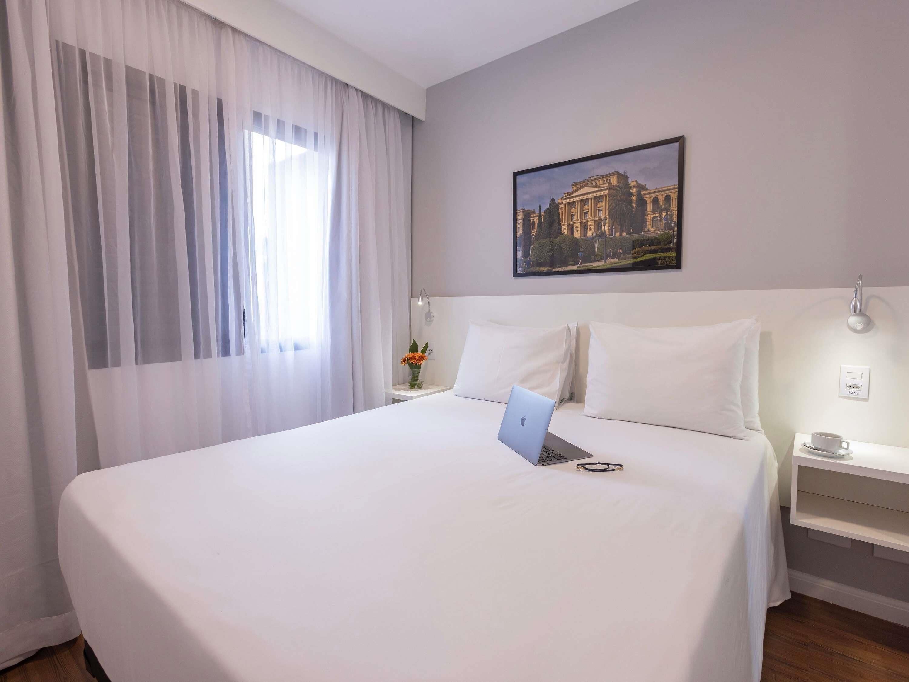 Apartamento Premium, 1 cama casal 1 cama solteiro e 1 banheiro | Minibar y caja de seguridad en la habitación 