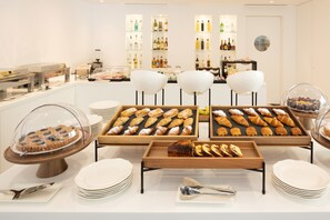 Daily buffet breakfast (EUR 25.00 per person)