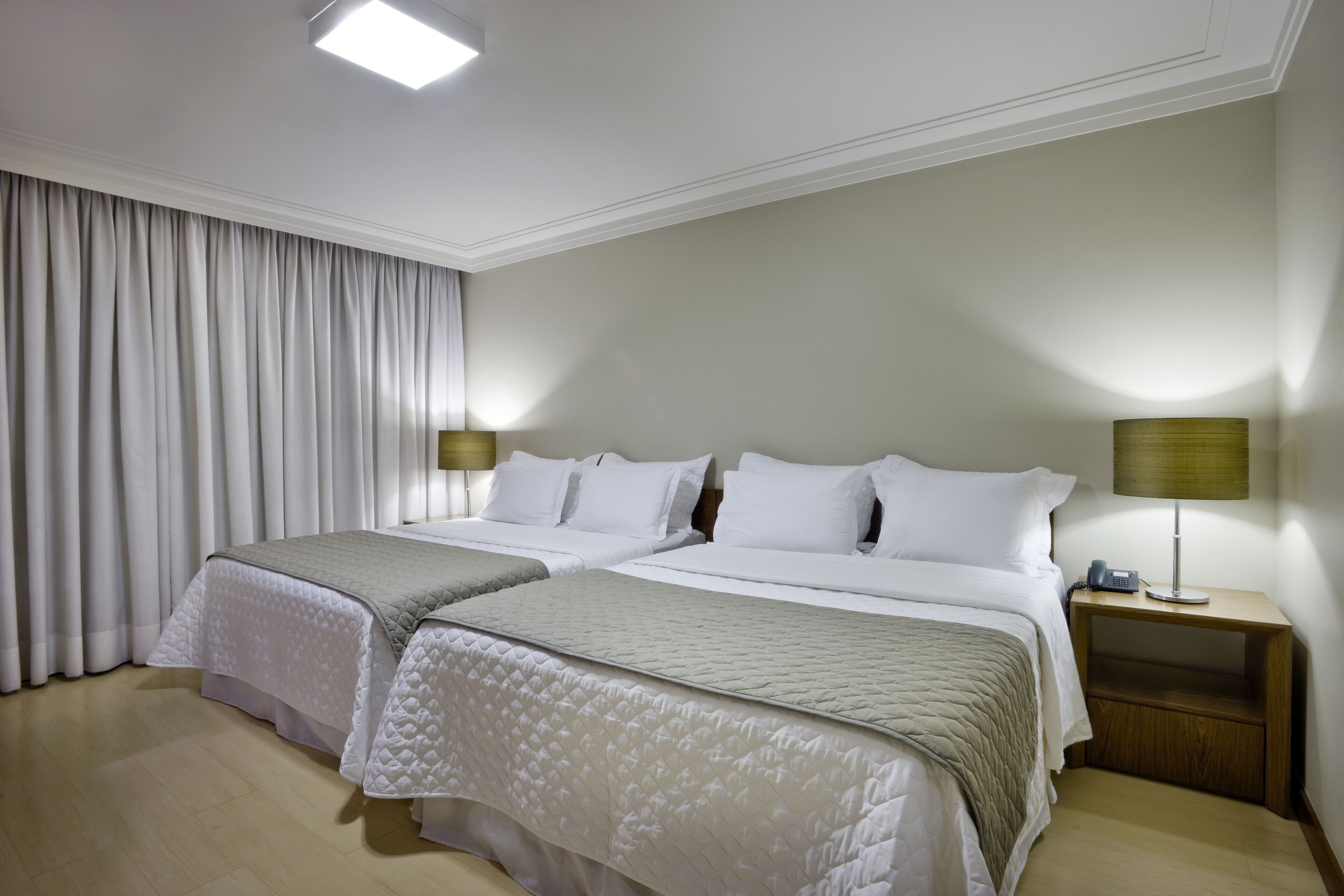 deluxe twin room | 1 bedroom, minibar, desk, blackout curtains