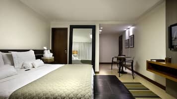 Minibar, desk, blackout drapes, iron/ironing board