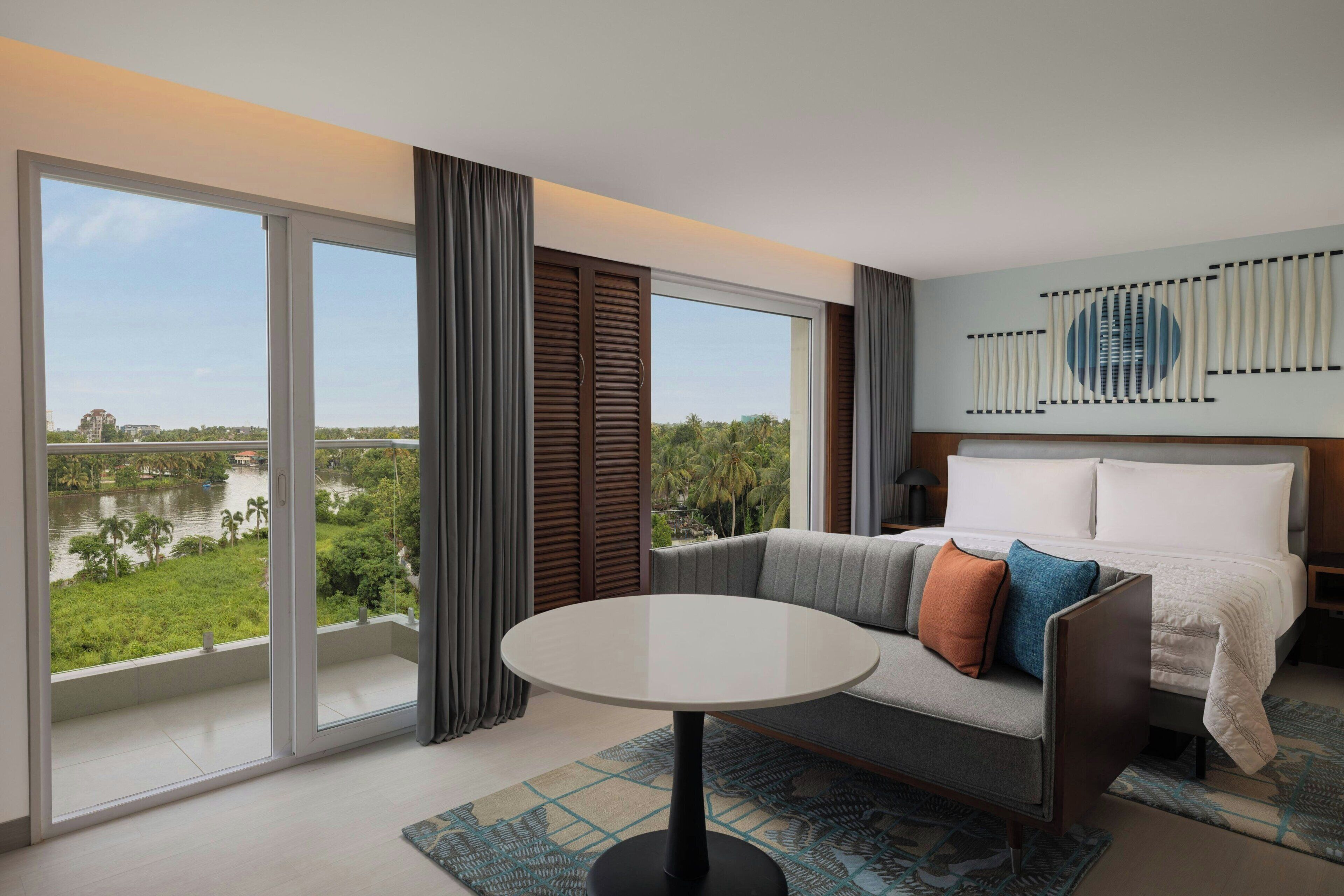 Deluxe Room, 1 King Bed, Balcony (View) | Premium bedding, minibar, in-room safe, desk