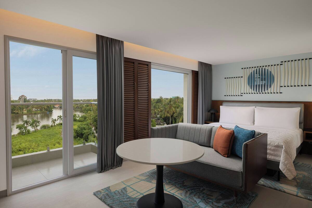 Deluxe King Backwater Island with Balcony  | Premium bedding, minibar, in-room safe, desk