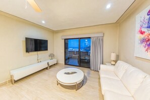 Junior Suite, Ocean View | Living area | LED TV, Netflix