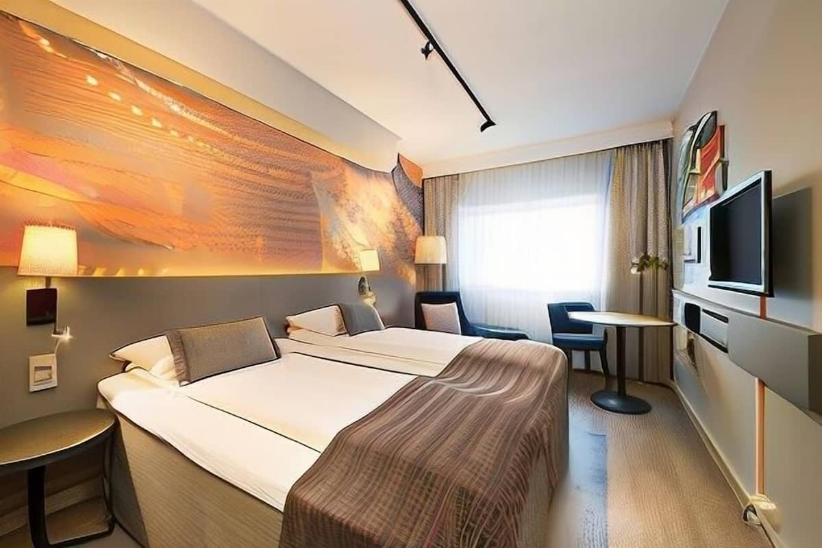 Desk, blackout curtains, WiFi, bed sheets