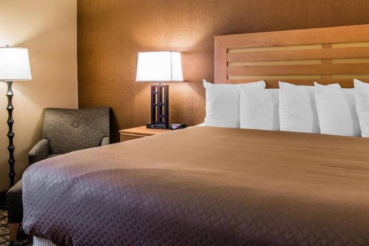 Down comforters, desk, blackout drapes, iron/ironing board