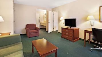 Premium bedding, desk, laptop workspace, blackout curtains