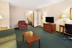 Premium bedding, desk, laptop workspace, blackout curtains