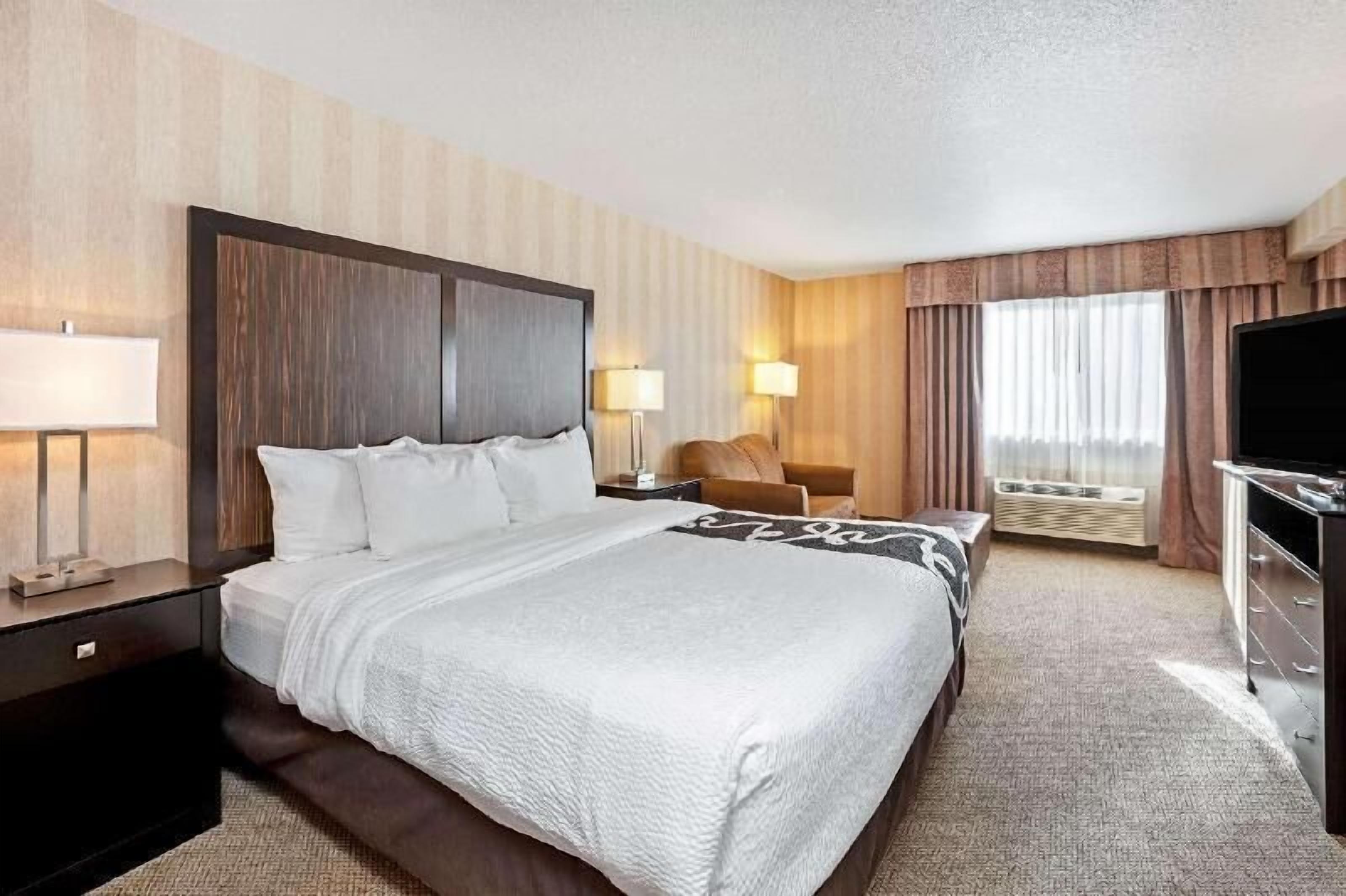 Premium bedding, desk, blackout curtains, iron/ironing board