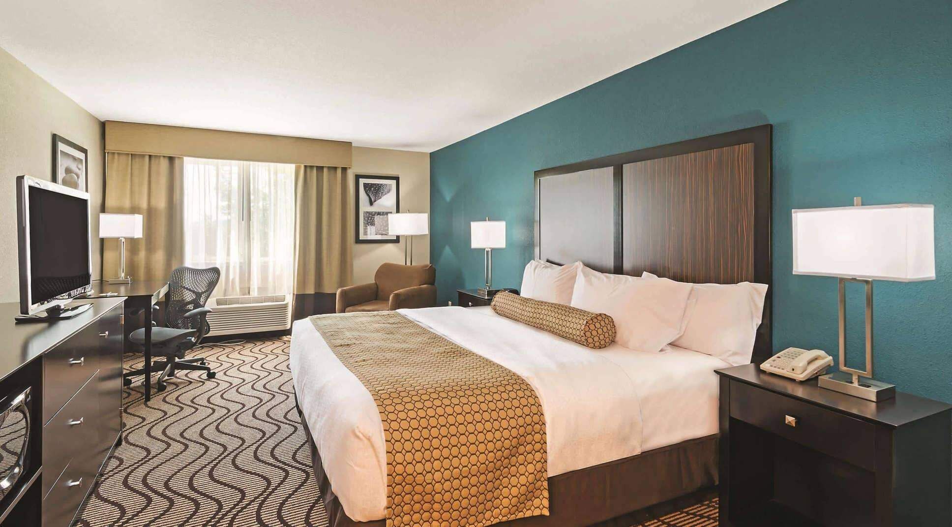 Premium bedding, desk, blackout curtains, iron/ironing board