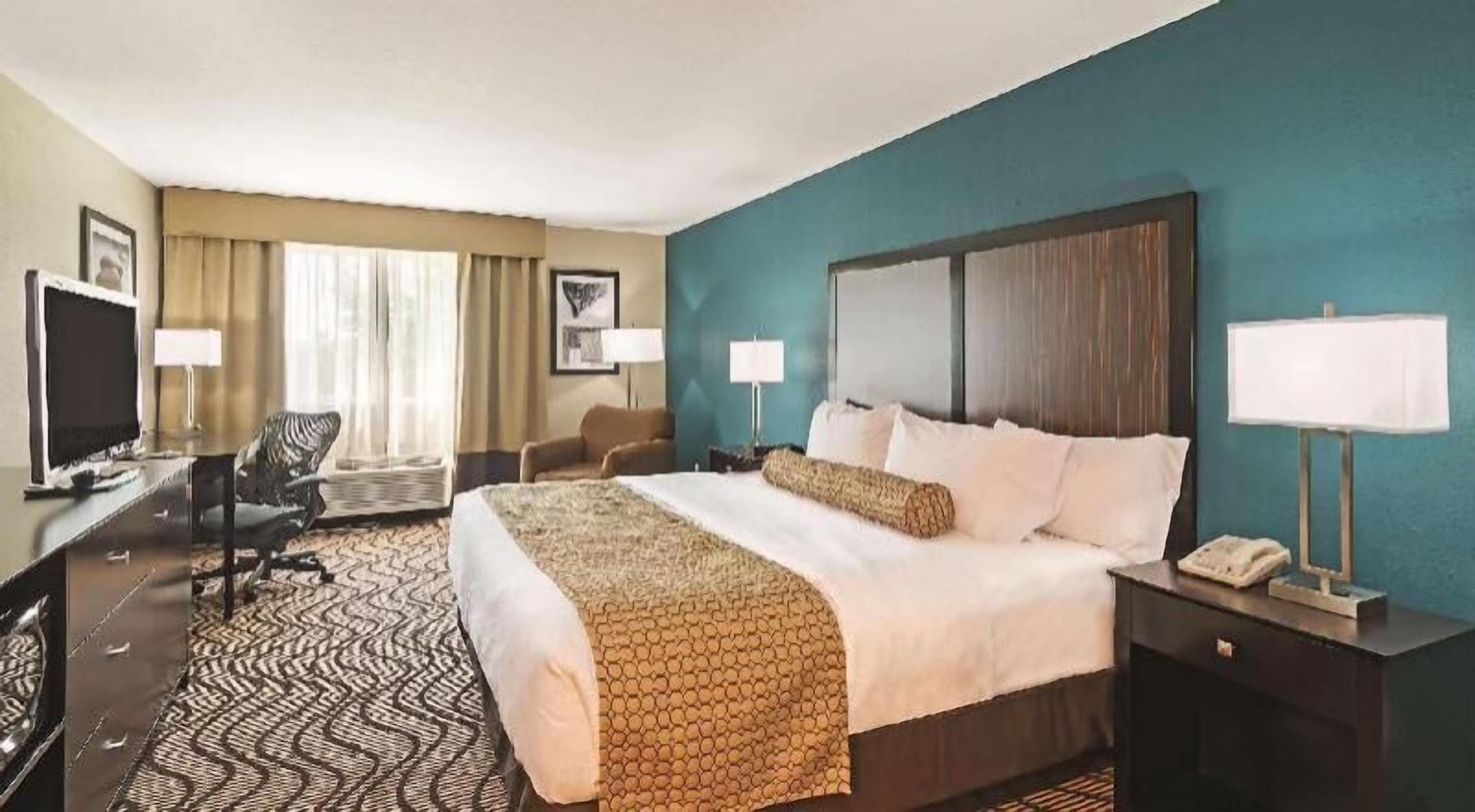 Premium bedding, desk, blackout curtains, iron/ironing board
