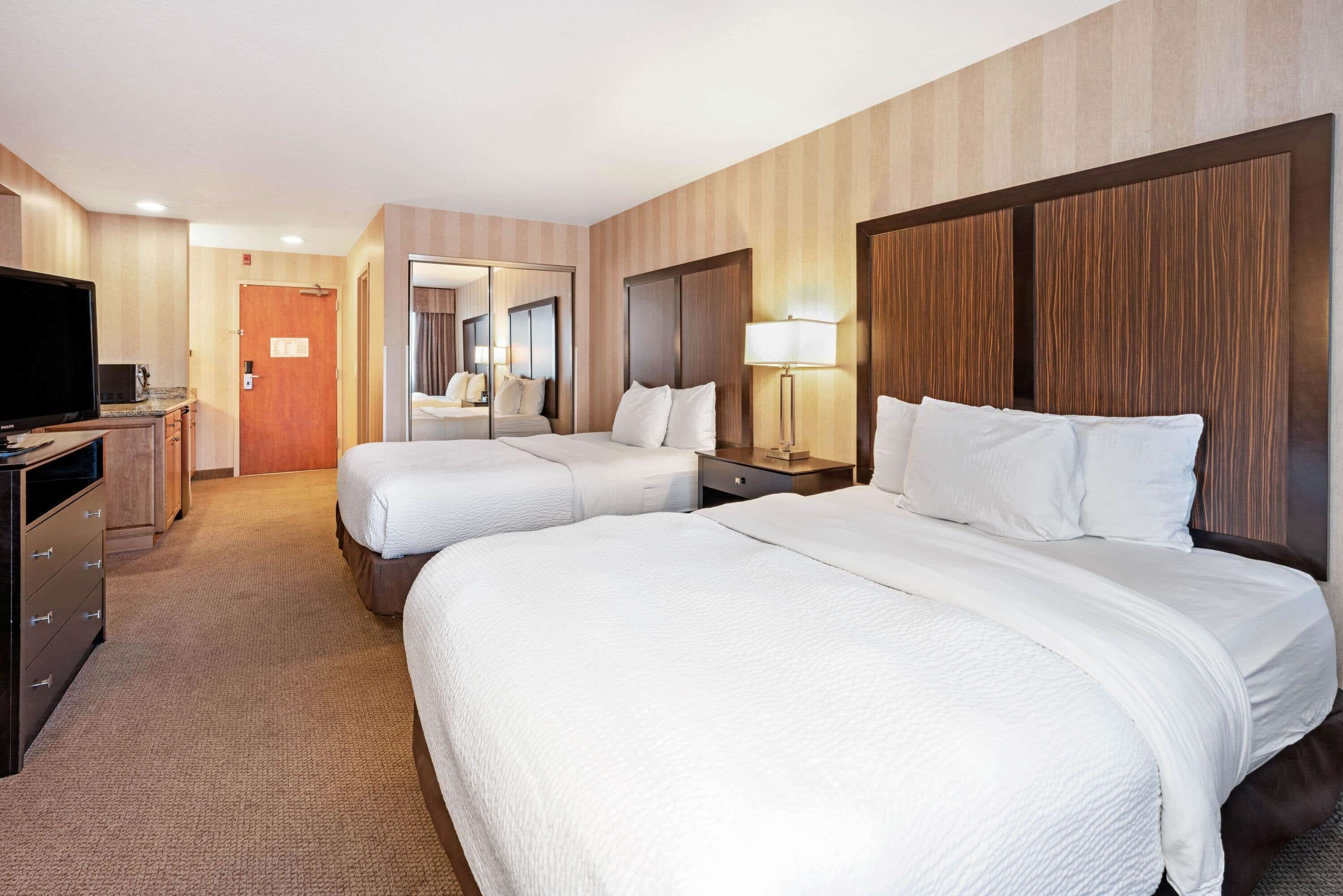 premium bedding, desk, blackout curtains, iron/ironing board