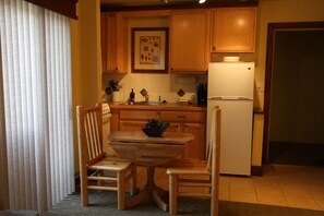 Studio (Condo) | Private kitchen | Fridge, microwave, stovetop, dishwasher