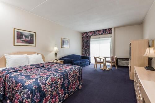 Premium bedding, desk, blackout curtains, iron/ironing board