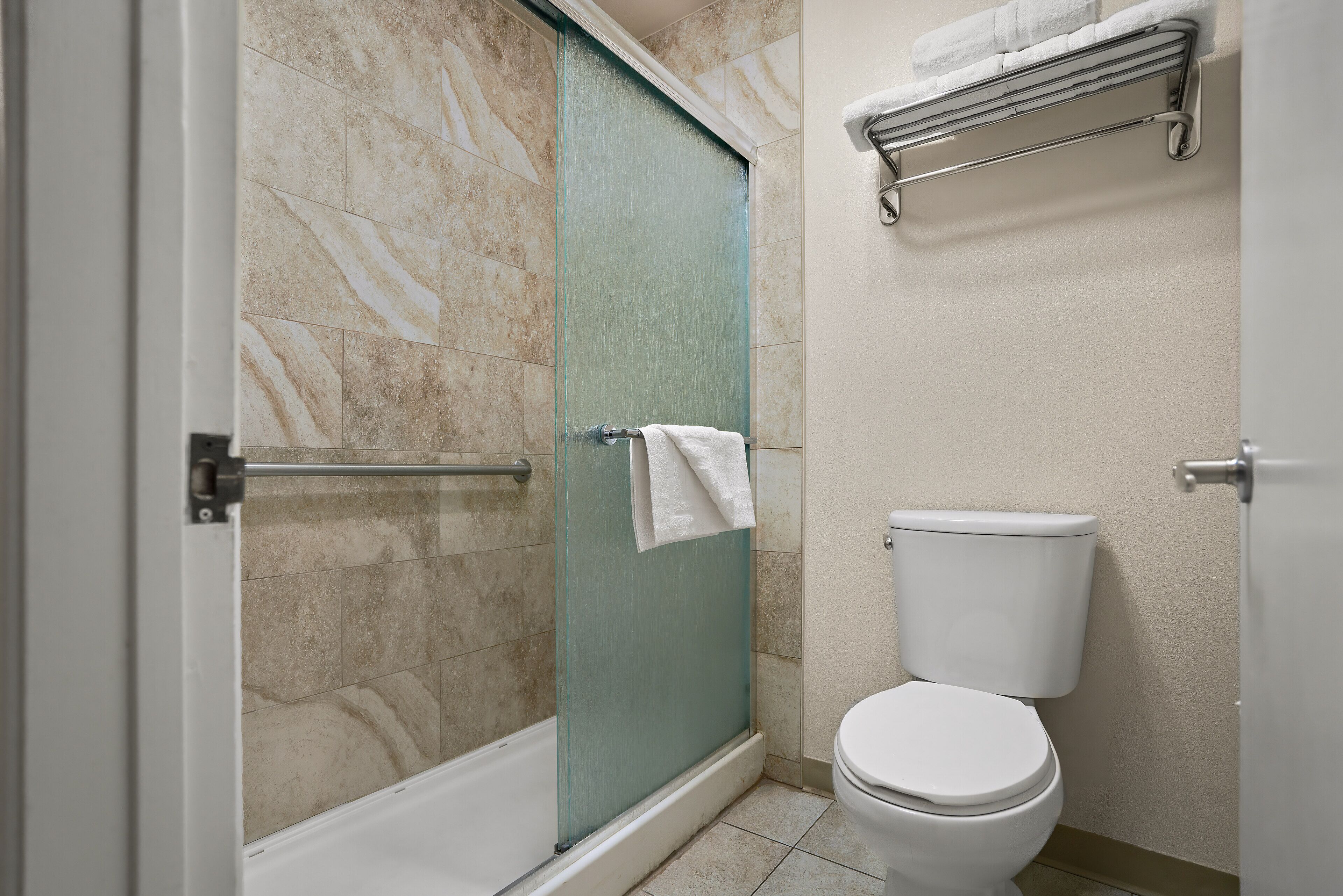 eco-friendly toiletries, hair dryer, towels, soap