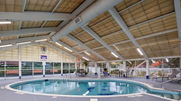 Indoor pool, open 9:00 AM to 9:00 PM, pool loungers