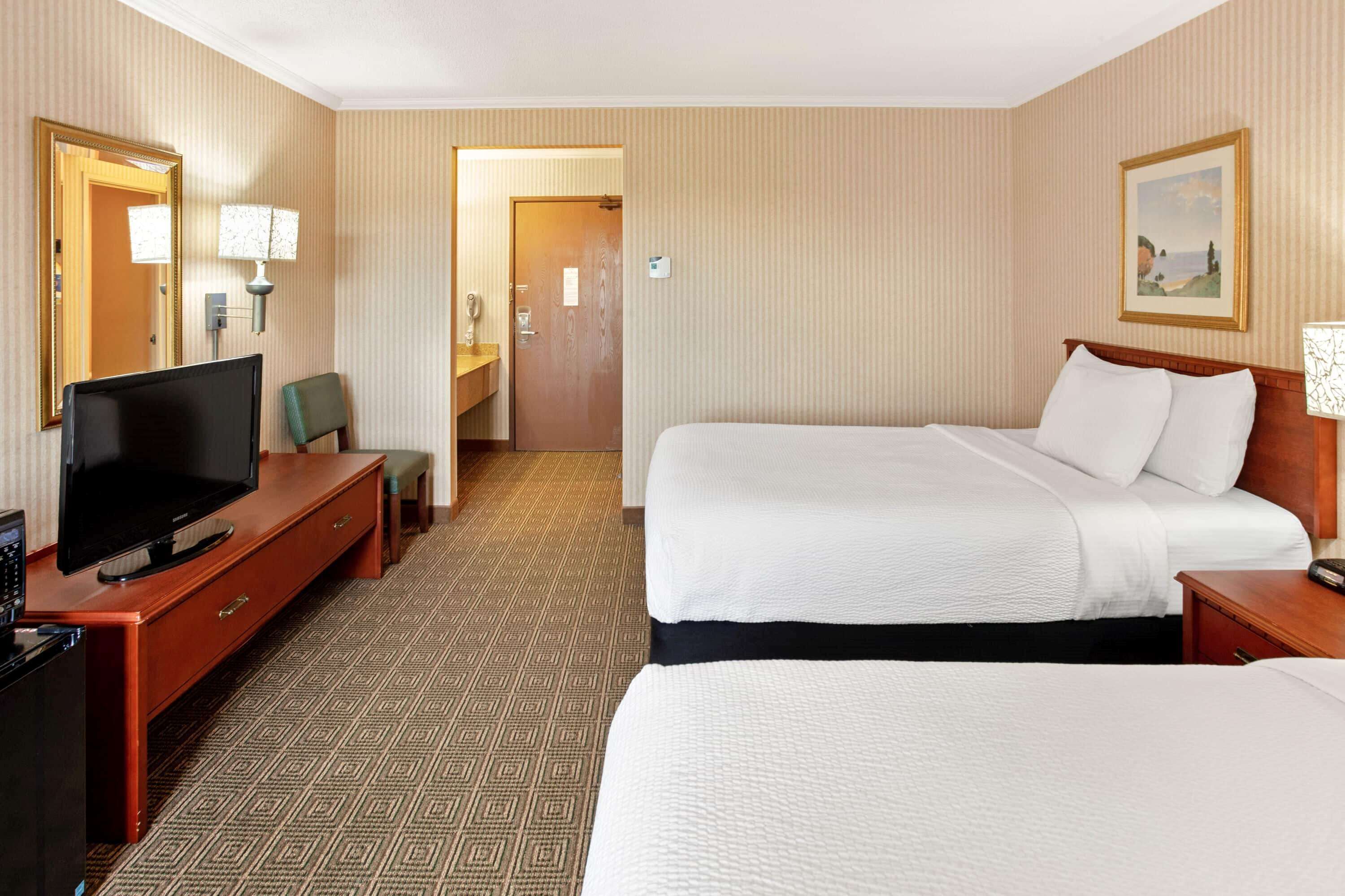 desk, laptop workspace, blackout curtains, iron/ironing board