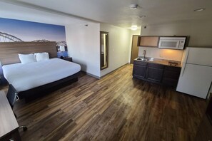 Suite, 1 King Bed, Non Smoking | Desk, iron/ironing board, cribs/infant beds, rollaway beds