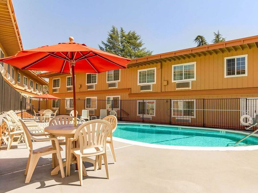 Seasonal outdoor pool, open 9:00 AM to 9:00 PM, pool loungers