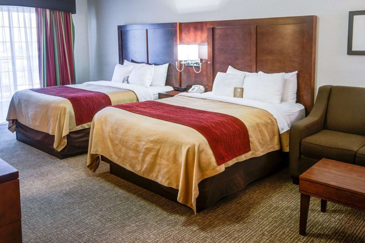 Premium bedding, pillow-top beds, desk, blackout curtains