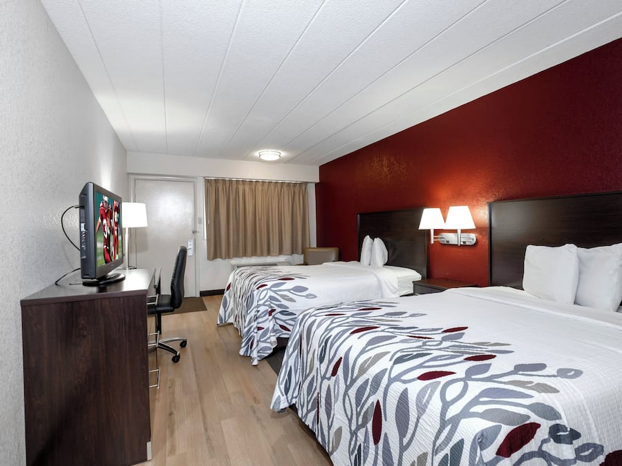 Blackout drapes, cribs (free), rollaway beds (surcharge), WiFi (free)