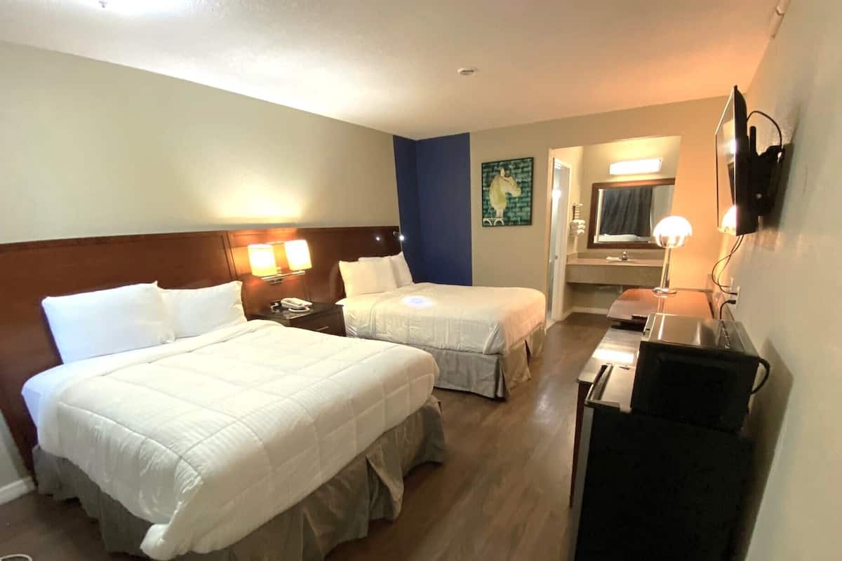 Room, 2 Queen Beds, Non Smoking | Desk, blackout curtains, iron/ironing board, free WiFi