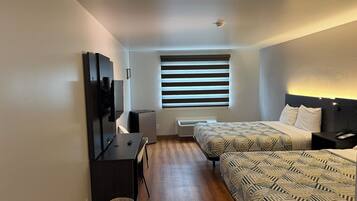 Desk, laptop workspace, free WiFi, bed sheets