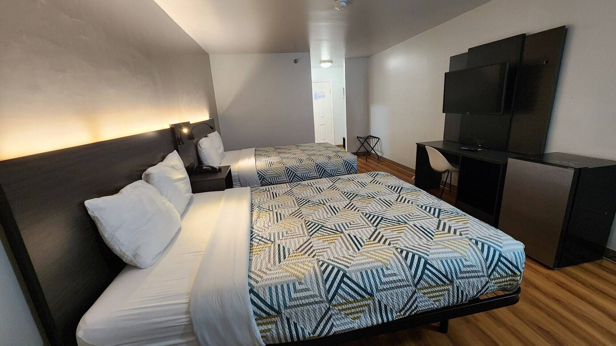 Desk, laptop workspace, free WiFi, bed sheets