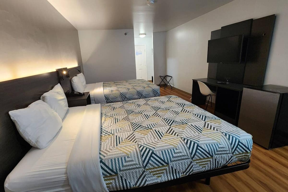 Desk, laptop workspace, free WiFi, bed sheets