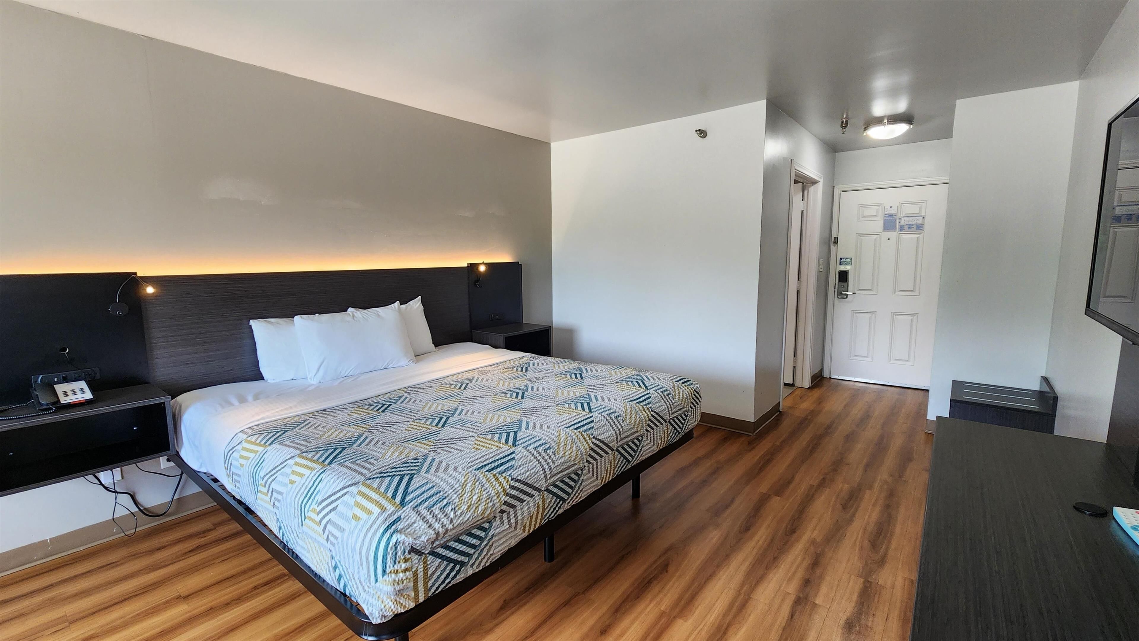 Desk, laptop workspace, free WiFi, bed sheets