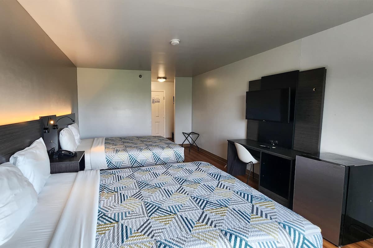 Desk, laptop workspace, free WiFi, bed sheets