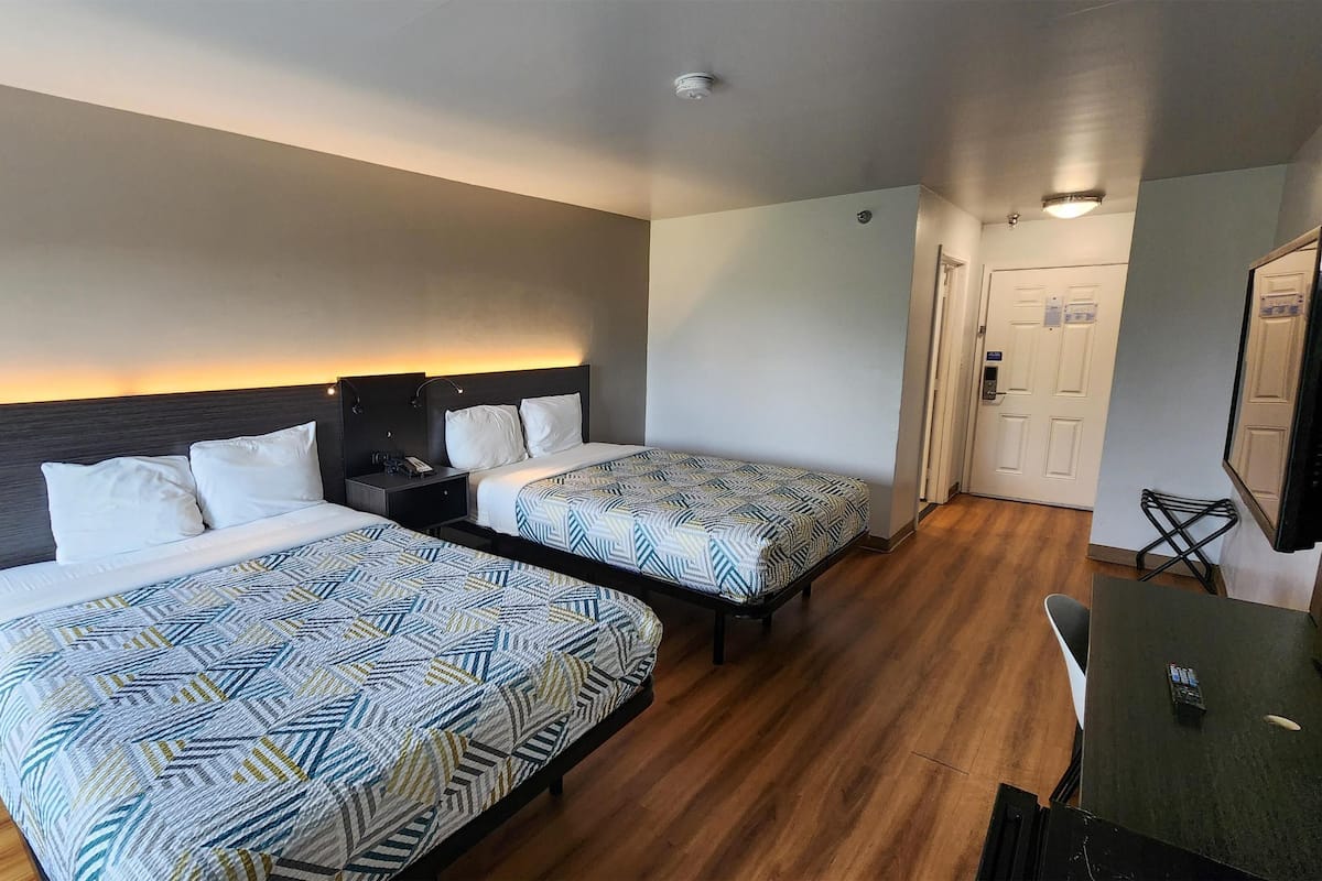 Desk, laptop workspace, free WiFi, bed sheets